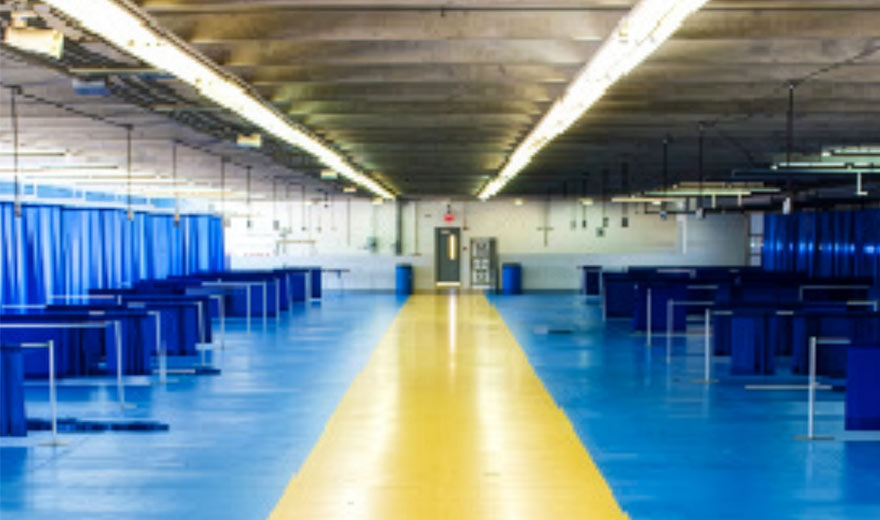 An interior photo of Charlotte Motor Speedway after installation of shatterproof lamps